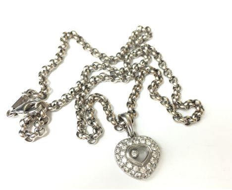 CHOPARD HAPPY DIAMONDS HEART PENDANT.
A Chopard Happy Diamonds collection 18ct White gold Diamond set heart pendant and chain
