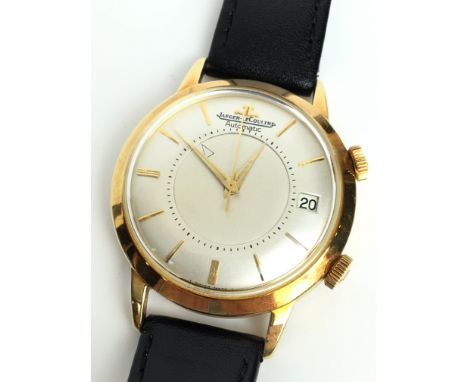 A GENTLEMANS 18K GOLD JAEGER LECOULTRE MEMOVOX AUTOMATIC BUMPER OVERSIZED WRIST WATCH 
 •Silvered dial with gold numerical ba