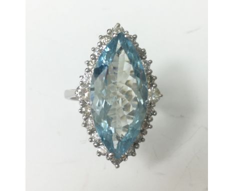 18CT WHITE GOLD DIAMOND AND AQUAMARINE RING
A large 18ct white gold Diamond and Aquamarine cluster ring. The marquis shaped A