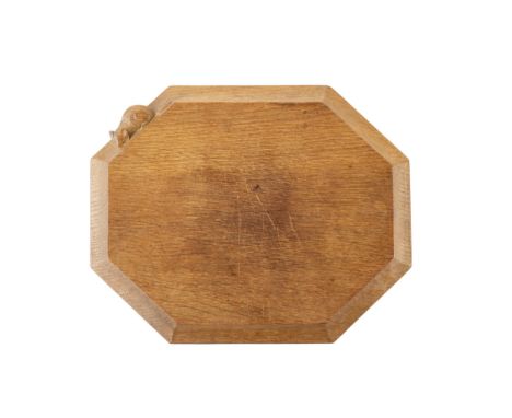 Robert Thompson of Kilburn (1876-1955)Mouseman breadboardoakcarved mouse signature31cm across.