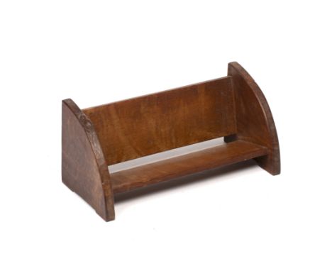 Robert Thompson of Kilburn (1876-1955) Mouseman book trough, circa 1940oakcarved mouse signature45 x 20 x 20cm.  The back pan