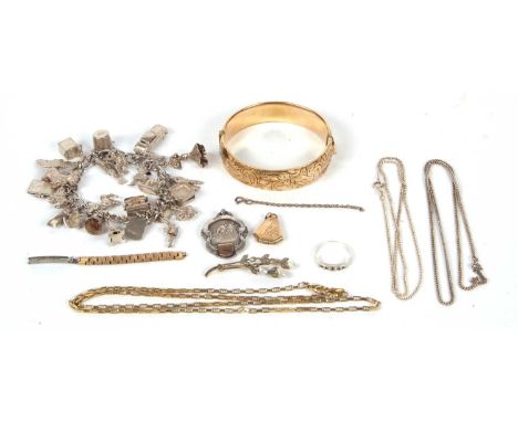 A mixed lot of jewellery: to include a sapphire ring stamped 925, a silver hockey medallion and chain, a charm bracelet, a ro