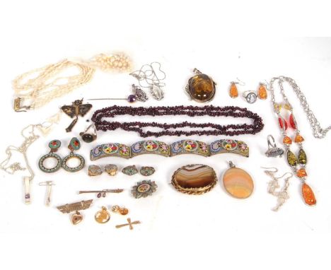 A mixed lot of antique and modern jewellery: to include an amethyst stick pin stamped 9ct and amethyst bar brooch stamped 9ct