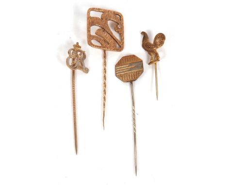 Four stick pins: to include a modern square textured pin set with a single diamond, hallmarked London 1992, 4.5g; and three o