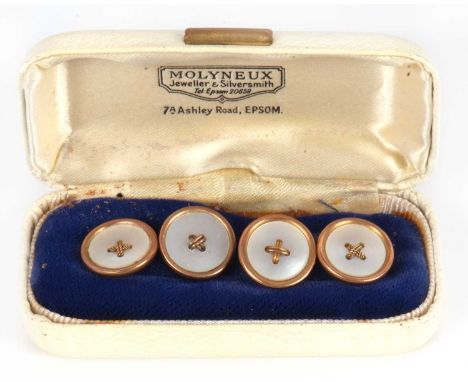 A pair of mother-of-pearl cufflinks, the round mother-of-pearl button style cufflinks, stamped 9ct to reverse, 15mm diameter,