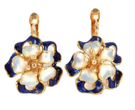 A pair of 18ct enamel earrings, the central white enamelled flower with gold stamens, surrounded by blue enamelled open outer