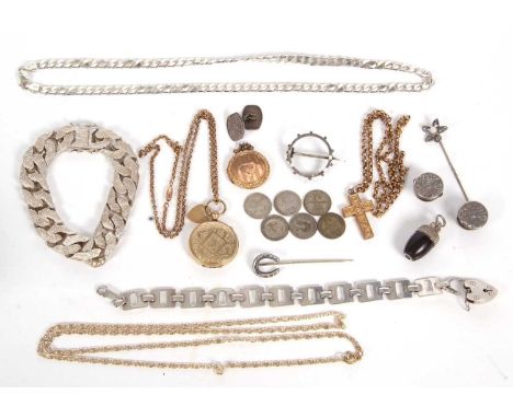 A mixed lot of jewellery: to include an unmarked yellow metal cross and chain, an unmarked yellow metal round locket and chai