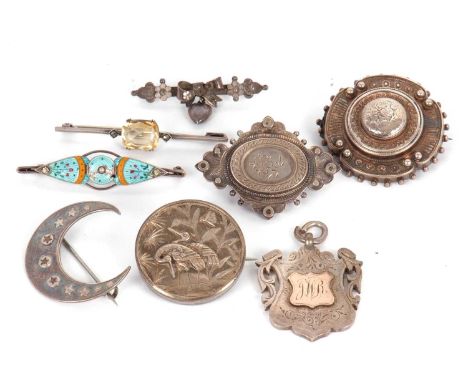 A quantity of silver and white metal jewellery: to include an early 20th century style enamel brooch stamped 'silver'; a silv
