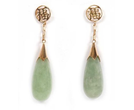 A pair of jade earrings, the teardrop shape jade drops, with yellow metal caps and Chinese character tops, unmarked (test as 