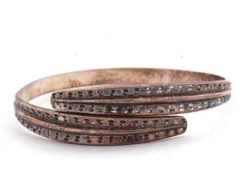 A David Andersen wraparound silver bangle, the crossover style wraparound style bangle with textured finish and plain lower b