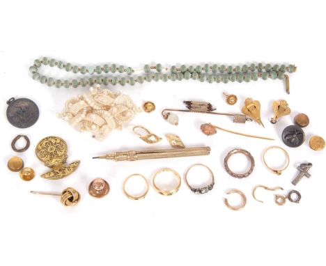 A mixed lot of jewellery: to include two rings stamped 18, 6.4g; two other unmarked rings, 3.1g; a garnet eternity ring, 2.1g