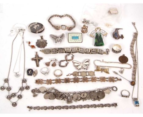 A mixed lot of silver and white metal jewellery: to include a panther bangle with gemset heads, filigree, necklaces, brooches