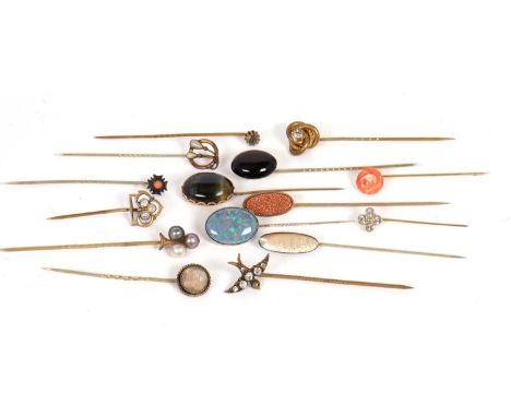 Fifteen assorted stick pins: to include coral, opal, shell, paste, sunstone and others, 28.2g, (15)
