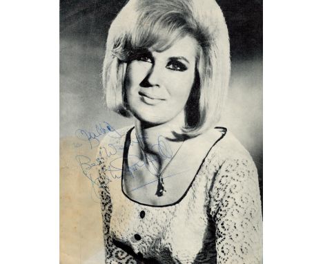 Dusty Springfield signed 10x8 inch black and white vintage magazine photo. Music Autograph. Good condition. All autographs ar