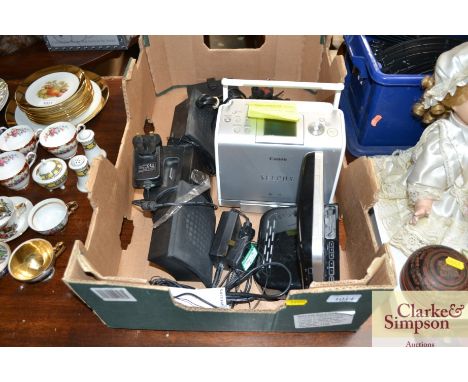 A Canon SEL PHY Compact photo printer, Phillips repeat alarm etc.