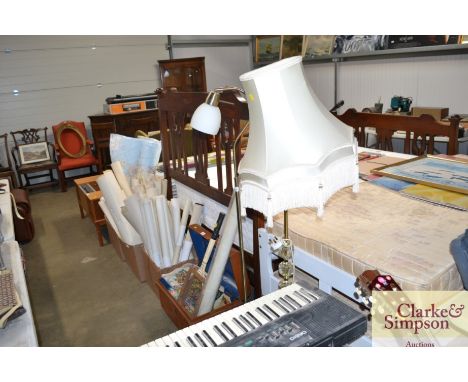 A modern brass standard lamp with shade, and a modern brass effect standard lamp