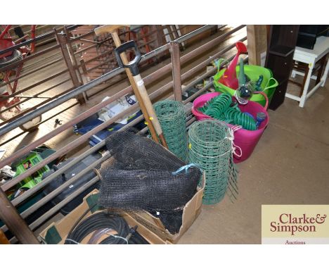 Are two rolls of plastic fencing, box of plastic netting and fork &amp; edging spade