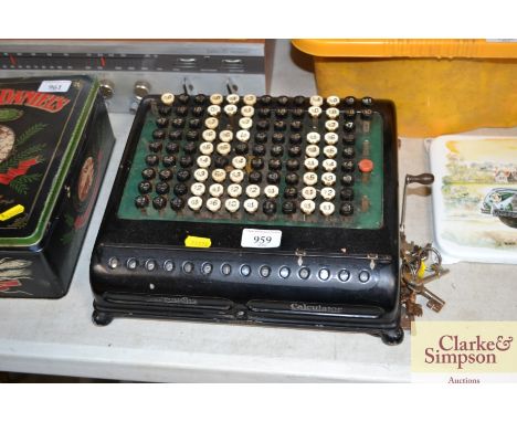 A vintage Burroughs calculator (made in the USA) and a small bunch of keys 