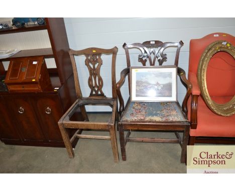 A mahogany Chippendale style elbow chair and another similar standard chair 
