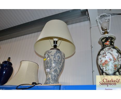 A modern blue and white pottery lamp and shade