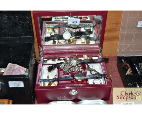 A jewellery box and contents to include silver curb link chain, various rings wrist watches, cuff-links and an opal set stick