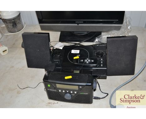 A CD player with pair of speakers and a Roberts radio 