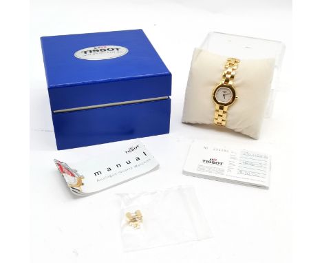 Tissot 1853 gold tone ladies quartz wristwatch with mother of pearl dial #G330K in original retail box with booklet + papers 