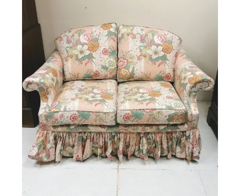 Vintage 2 seater sofa upholstered in pink floral fabric - in good used condition - 144cm x 82cm x 78cm