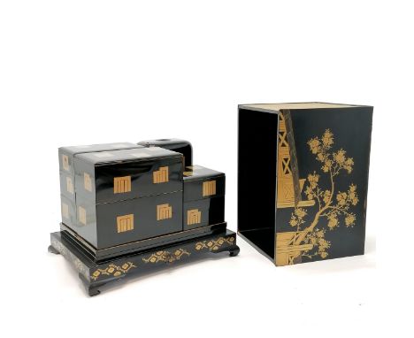 Japanese antique lacquer calligraphy ? set comprising of stand with 7 interlocking boxes, liquid container with metal pourer 