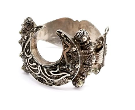 Antique ethnic unmarked silver bangle with crescent &amp; script centre detail - 7cm across &amp; 43g ~ slight distortion