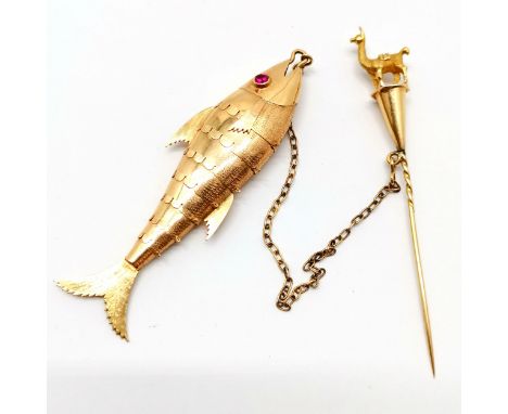 South American unusual unmarked (touch tests as 18ct) gold brooch in the form of an articulated fish (8cm) with ruby stone se