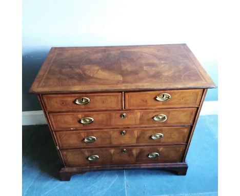 Antique walnut veneered bracket foot chest of 2 over 3 drawers with herring bone detail &amp; marquetry top, solid oak drawer