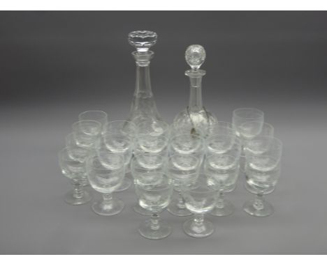 Fine cut glass decanter with silver 'Port' label, set twelve etched wine glasses, ten small etched wine glasses and a cut gla