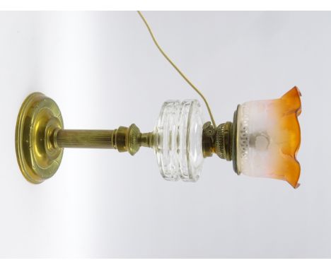 Victorian brass column table oil lamp with facetted clear glass reservoir and clear shading to amber glass floral decorated s