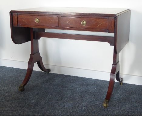 Regency mahogany cross banded sofa table, rectangular top having drop leaves with rounded corners to each end, two frieze dra