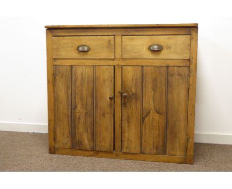Early 20th century pine cupboard, rectangular top above two drawers, slatted doors to base enclosing shelf, W104cm, H94cm, D4