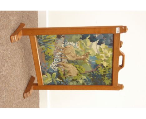 'Mouseman' Yorkshire oak fire screen by Robert Thompson of Kilburn, needle work panel depicting a scene of deer drinking from