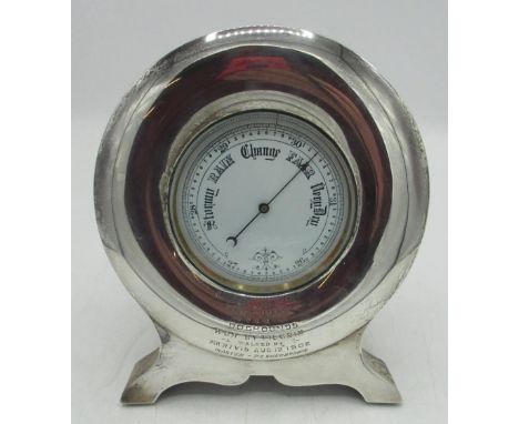 Early C20th presentation Aneroid barometer with 9cm circular white enamel dial, in Edw.VII hallmarked silver circular easel f