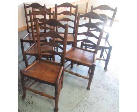 Set of six C19th Country made ash and elm dining chairs, shaped ladder backs and solid seats on turned supports joined by str