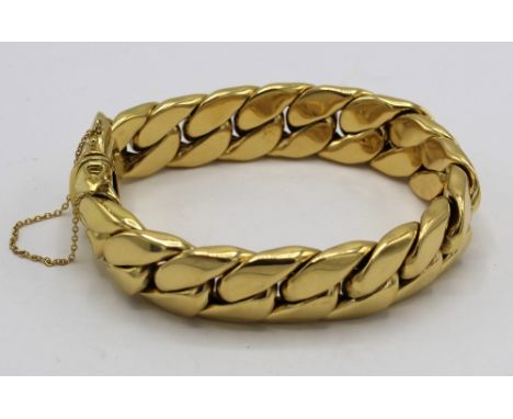Kutchinski 18ct gold curb chain bracelet with tongue and groove fastener, twin catches and safety chain, import hallmarked fo