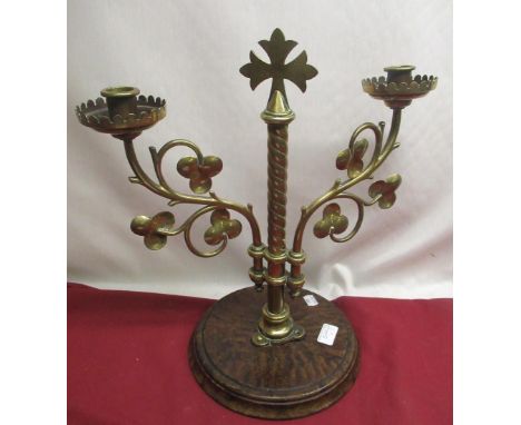 C20th brass Ecclesiastical two light candelabra, wrythen column with two clover leaf branches and Gothick sconces, on stepped