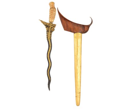 ‡˜A FINE MALASIAN DAGGER (KRIS), LATE 19TH AND EARLY 20TH CENTURY with blackened wavy pattern-welded blade chiselled and gilt