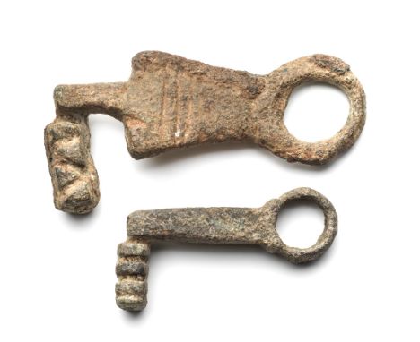 TWO BRONZE ROMAN KEYS AND SIX OTHER KEYS one larger but both of L-shape form, together with six later keys including one bron