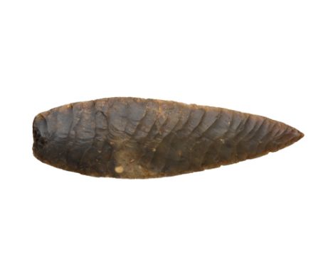 A NEOLITHIC PERIOD HALBERD, SCANDINAVIAN, CIRCA 2500 BC with ridged sides tapering to a point 16.5 cm; 6 1/2 in