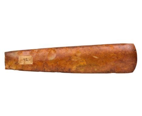A RARE POLISHED NEOLITHIC PERIOD AXE, SCANDINAVIAN, CIRCA 2500 BC of amber colour and with a thick neck 28.1 cm; 11 in