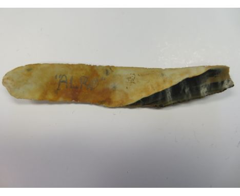 A NEOLITHIC PERIOD BURIN, SCANDINAVIAN, CIRCA 2500 BC with smooth flat surfaces and jagged edges 15.5 cm; 6 1/8 in Provenance