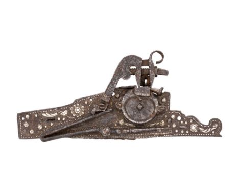 A RARE NORTH EUROPEAN SILVER-ENCRUSTED DETACHED WHEEL-LOCK MECHANISM FROM A SMALL PISTOL, CIRCA 1600, PROBABLY ENGLISH with s