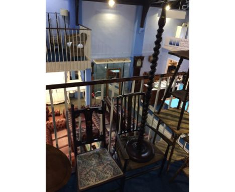 A barley twist standard lamp and two Edwardian chairs