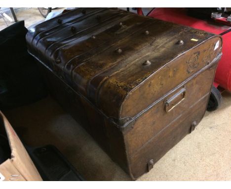 A tin steamer trunk