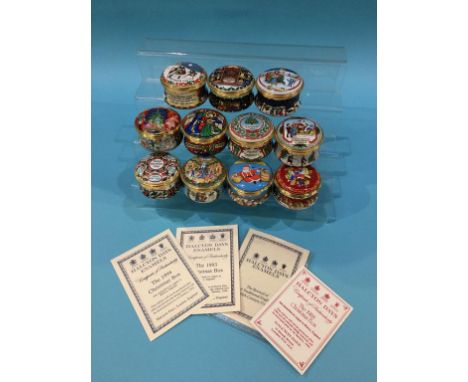 A collection of enamel Halcyon Days boxes